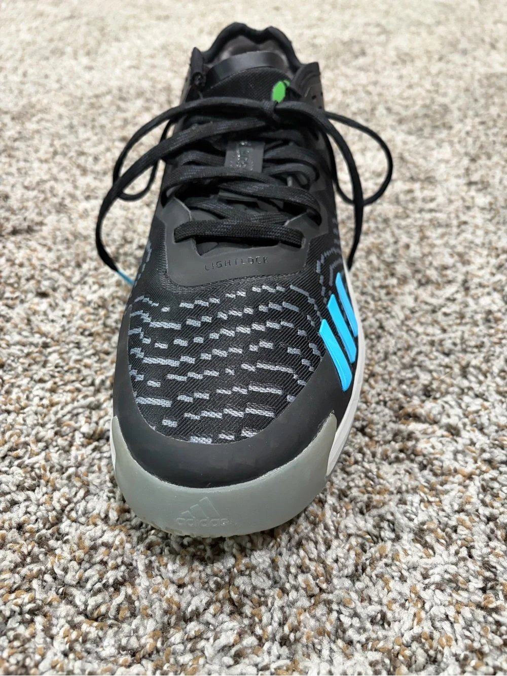 adidas Men's D.O.N Issue #4 Black Sneaker with Bright Blue Three Stripes